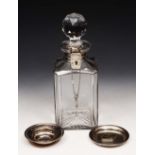 A LATE 19TH CENTURY SILVER MOUNTED BETJEMANN'S PATENT LOCKING DECANTER AND STOPPER, of faceted