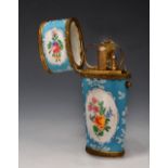 A FRENCH ENAMEL AND GILT METAL MOUNTED ETUI, partially fitted and with summer flower decoration on a