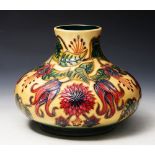 A MOORCROFT FLORAL PATTERN VASE, impressed and painted marks, and monogram DSM, 17cm high