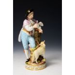 A 19TH CENTURY MEISSEN FIGURE of a young man, sending a love letter with a dove, a sheep at his