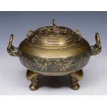 AN 18TH CENTURY CHINESE CAST BRONZE INCENSE BURNER AND COVER decorated dragons in clouds, 27cm