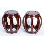 A PAIR OF MODERN CHINESE HARDWOOD CONSERVATORY SEATS of barrel form, 44cm high (2)