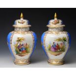 A PAIR OF DRESDEN BALUSTER VASES AND COVERS painted with alternating panels of courting couples