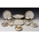 A 19TH CENTURY DERBY PART DESSERT SERVICE painted and gilt heightened with stylised foliate borders,
