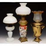 A JAPANESE PORCELAIN AND GILT METAL MOUNTED OIL LAMP with white glass shade, 69cm high overall,