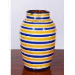 A CONTINENTAL POTTERY SLIP WARE GLAZED TAPERING VASE with alternating yellow and blue banding,