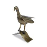 A 19TH CENTURY WEST AFRICAN, BENIN BRONZE FINIAL in the form of a bird with engraved plumage and