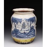 A 19TH CENTURY ITALIAN MAIOLICA ALBARELLO painted with stag in a landscape in blue above a yellow