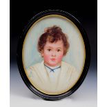 AN OVAL PAINTED PORTRAIT of S.A.S. Montagu, 3rd Baron Swaythling Aged 2, signed with a monogram