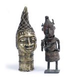 A BENIN BRONZE HEAD of an Oba or traditional ruler with lattice head dress, 31cm high; and Benin