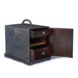 A JAPANESE WOOD AND COPPER CASKET, the interior fitted two drawers enclosed by panelled door with