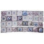 A COLLECTION OF THIRTY ONE 18TH CENTURY DELFT TILES, painted with figures and landscapes in blue and