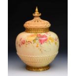 A ROYAL WORCESTER PORCELAIN POT POURRI VASE AND COVER painted with a spray of summer flowers on a