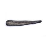 AN ANCIENT IRISH BOG OAK CLUB with rounded end and tapering handle, 48cm long