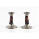 Moorcroft for Liberty & Co. Pair of 'Tudric' 'Pomegranate' candlesticks hammered pewter mounts and