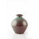 Trevor Corser (British, 1938-2015) at Leach Pottery Vase green and high fired red glaze impressed