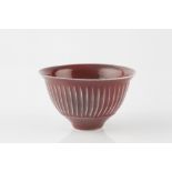 David Leach (British, 1911-2005) Bowl ox-blood red glaze, cut sides impressed potter's seal 8cm