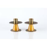 Modernist School Pair of candlesticks bakelite and brass 12.5cm diameter (2).