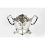 Orivit Secessionist twin handled centrepiece pewter, pierced with multitudes of flowers to the rim