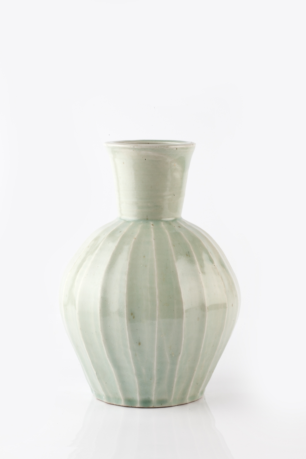 Trevor Corser (British, 1938-2015) at Leach Pottery Vase celadon, with cut facetted sides