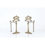 Art Nouveau Pair of fire dogs brass with sinuous flowerhead design 23.5cm high (2).