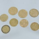 A collection of eight gold coins, to include two sovereigns,