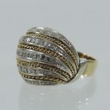 WITHDRAWN An 18 carat white and yellow gold diamond ladies dress ring