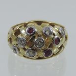 WITHDRAWN A 14 carat gold ruby and diamond dress ring