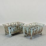 A pair of Victorian style painted cast iron openwork planters,