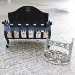 A black painted iron fire grate, 46cm,