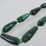 A malachite graduated bead single strand necklace