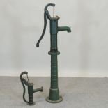 A green painted cast iron water pump, 129cm tall,