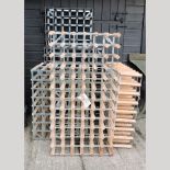 A collection of six various wine racks