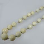 An early 20th century ivory bead necklace