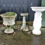 A white painted reconstituted stone figural bird bath, 84cm tall,