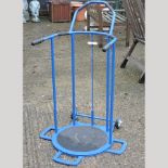 A blue painted metal mobility frame,