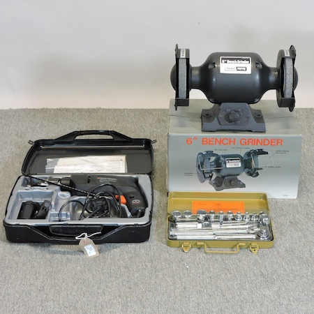 A bench grinder, boxed,