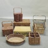 A collection of baskets and an antique leather case
