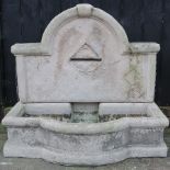 A reconstituted stone garden fountain,