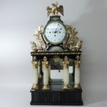 A 19th century painted wooden mantle clock, of architectural form with a musical box in base,