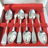 A matched set of six Victorian large silver, fiddle pattern teaspoons, by William Eaton, London,