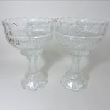 A pair of glass pedestal bowls,