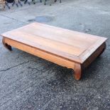 An oriental hardwood coffee table,