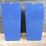 A pair of blue painted planters,