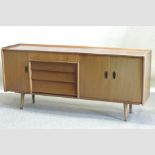 A 1960's teak sideboard, bearing a label for Utility,