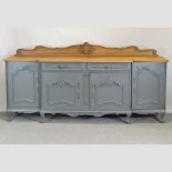 A mid 20th century French oak break front sideboard, painted grey,