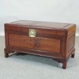 An early 20th century Chinese carved hardwood blanket box,