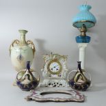 A 19th century French porcelain cased mantel clock, 19cm tall,