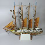 A prison art scratch built model of a ship, the Great Britain, 66cm tall,
