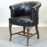 An early 20th century Globe Wernicke upholstered desk chair,